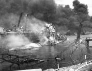 Asisbiz USS Shaw (DD 373) lies in drydock YFD 2 after being hit by three bombs which exploded her forward magazine 7th Dec 1941 80 G 19939