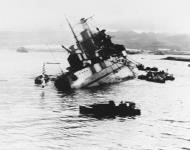 Asisbiz USS Utah (AG 16) Capsizing at Berth F 11 after she was torpedoed by Japanese planes Pearl Harbor 7th Dec 1941 80 G 266626