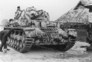 Asisbiz German armor Pzkpfw IV having its winter camouflage paint applied Ostfront ebay 01