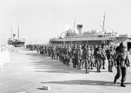 Asisbiz TORCH British paratroops disembarking pass the French liner Ville d'Oran background Algiers 12th Nov 1942 IWM NA89