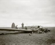 Asisbiz TORCH Heinkel He IIIH shot down by RAF 81Sqn FO KL Waud (standing) nr Bone Algeria 15th Nov 1942 IWM CNA73
