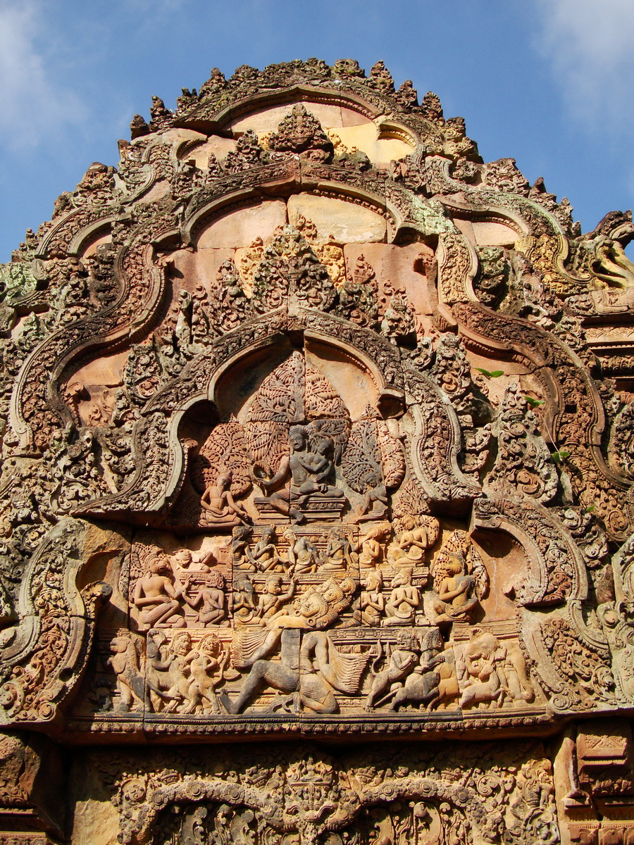 Banteay Srei red sandstone pediment shows Ravana shaking Mount Kailasa 02