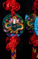 Asisbiz Jade Buddha Temple Ji Jong Hall area gift shops hanging medallions 05