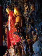 Asisbiz Great Hall northern entrance golden statue of with Shan Cai at her side 05