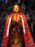 Asisbiz Great Hall northern entrance golden statue of with Shan Cai at her side 09