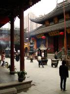 Asisbiz Great Hall northern entrance golden statue of with Shan Cai at her side 12