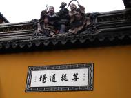 Asisbiz Jade Buddha Temple architecture featuring round entrance and ornate roofing decor 06