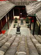 Asisbiz Jade Buddha Temple chamber upstairs area looking down at chinese temple archeitecture 01