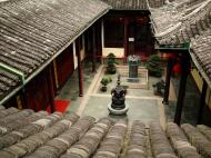 Asisbiz Jade Buddha Temple chamber upstairs area looking down at chinese temple archeitecture 02
