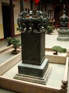 Asisbiz Jade Buddha Temple entrance section downstairs bronze artifacts and monuments 01
