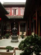 Asisbiz Jade Buddha Temple entrance section downstairs bronze artifacts and monuments 02
