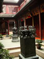 Asisbiz Jade Buddha Temple entrance section downstairs bronze artifacts and monuments 05