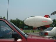 Asisbiz China Guangdong Shenzhen advertizing Blimp Aug 2001 01