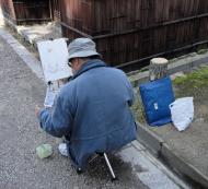 Asisbiz Kofuku ji Temple area walk way artist at work Nara Mar 2010 01