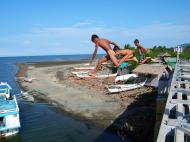 Asisbiz Kids diving of Naujan Estrella bridge Oriental Mindoro Philippines Feb 2006 25