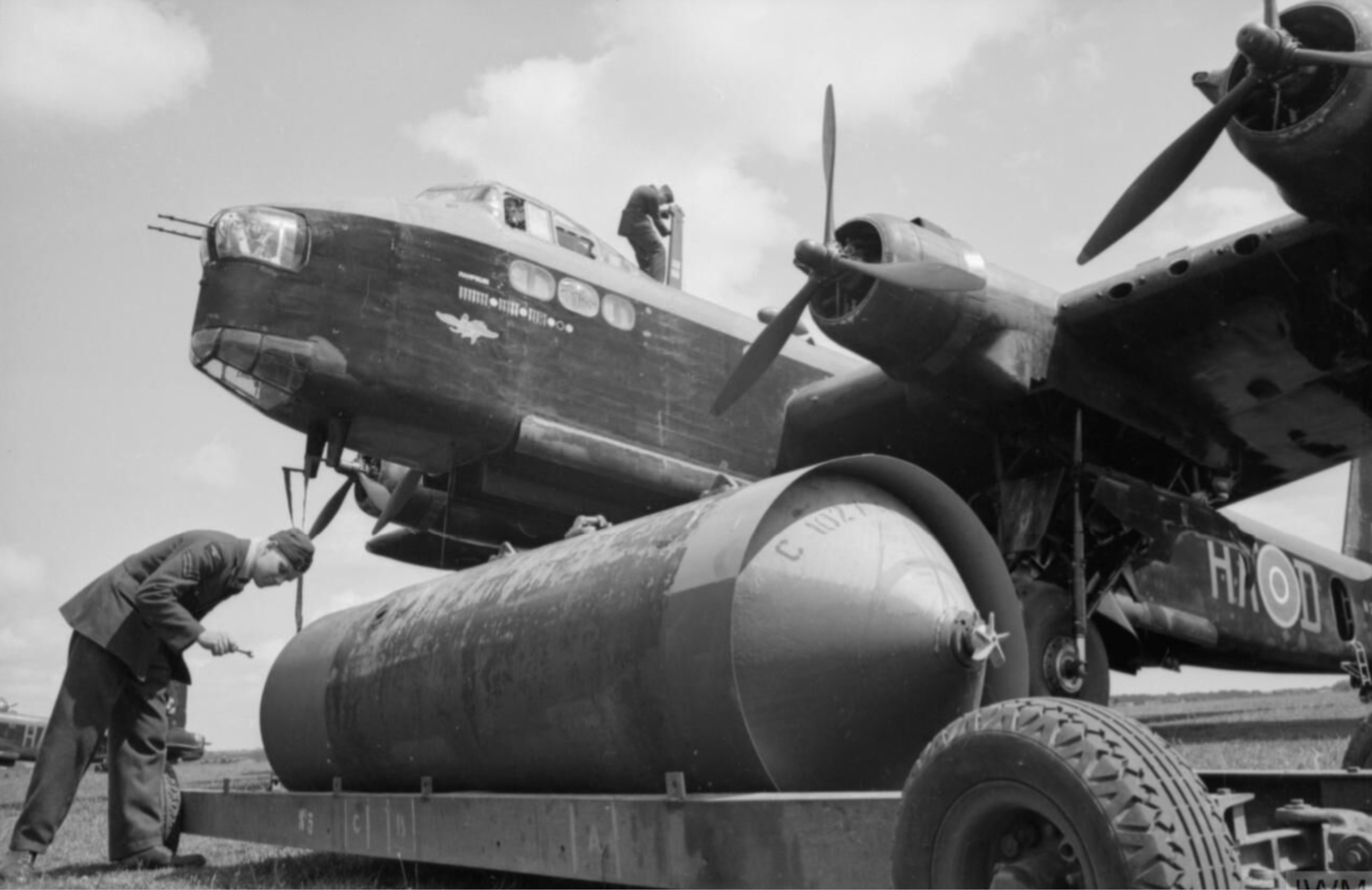 Short Stirling I RAF 218 Sqn HAD being loaded with a 4000lb coockie at Marham Norfolk night raid on Emden Germany