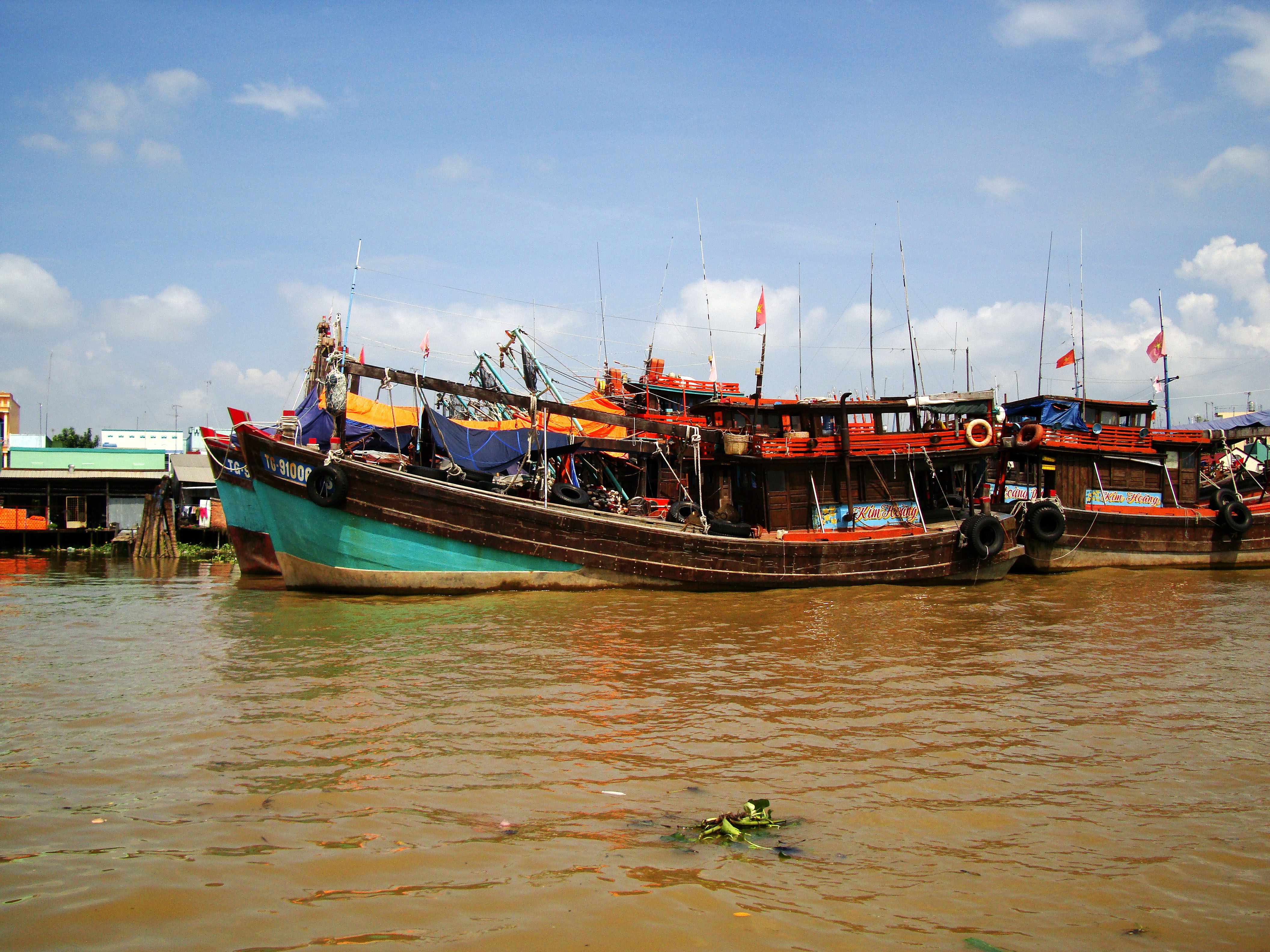 Mekong Delta Saigon river Vietnamese fishing boats Nov 2009 02