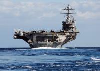 Asisbiz USN color photo USS Harry S Truman (CVN 75) sails out of Souda harbor in Crete