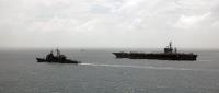 Asisbiz USN color photo guided missile cruiser USS Bunker Hill (CG 52) and the USS Dwight D Eisenhower (CVN 69) Jan 2007