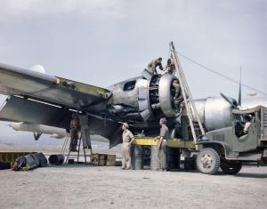 Asisbiz WWII color photo of a Maintenance crew working on the Engine of a Boeing B 29 in China 01