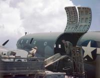 Asisbiz WWII USAAF color photo of Air Transport Command unloading a Curtiss C 46 in China 01