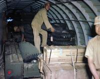 Asisbiz WWII USAAF color photo of Air Transport Command unloading a Curtiss C 46 in China 02