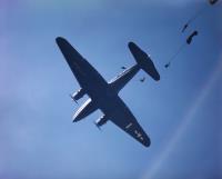 Asisbiz WWII USAAF color photo of Parachutists Jumping from a Curtiss C 46 Transport 01