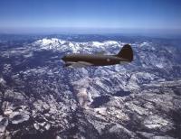 Asisbiz WWII color photo of USAAF 41 12352 Curtiss C 46A Commando over the Sierra Nevada Mountains 02
