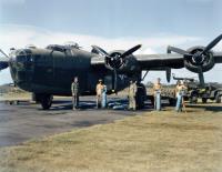 Asisbiz WWII color photo of USAAF Consolidated B 24D Liberator training aircraft being loaded in USA 1943 01
