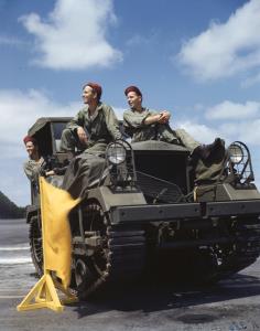 Asisbiz WWII color photo of Mechanics on a Utility Tractor 01