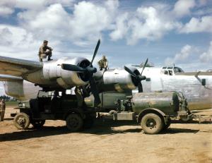Asisbiz WWII color photo of Utlity Vehicle Fuel Truck gassing Up a Consolidated B 24 in China 01