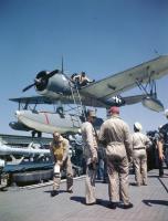 Asisbiz OS2U has been hoisted aboard and set onto a catapult on the USS Missouri (BB 63
