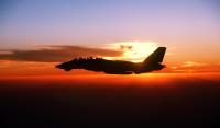 Asisbiz USN Grumman F 14A Tomcat VF 32 silhouetted against evening sky Operation Desert Storm from USS John F Kennedy 1991 B