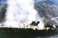 Asisbiz Japanese aircraft carrier Hiryu burning shortly after sunrise Battle of Midway on 5th June 1942 asis colorized