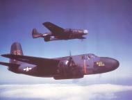 Asisbiz 39 753 P 70 Havoc nightfighter with its type replacement P 61 Black Widow in flight 01