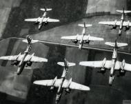 Asisbiz 43 10152 A 20G Havoc 9AF 410BG646BS 8UM Maxine IV in a tight defensive box formation with 8UA FRE11086