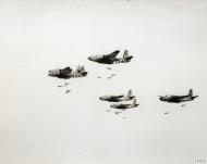 Asisbiz Douglas A 20 Havocs 9AF 416BG669BS with 2AG 2AH 2AA 2AF 2AG and 2AR drop their bombs over the DZ FRE11114