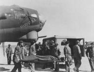 Asisbiz 42 38066 B-17G Fortress 15AF 2BG20BS Marishka with a WC 54 Dodge Ambulance Italy 6th Jun 1944 02