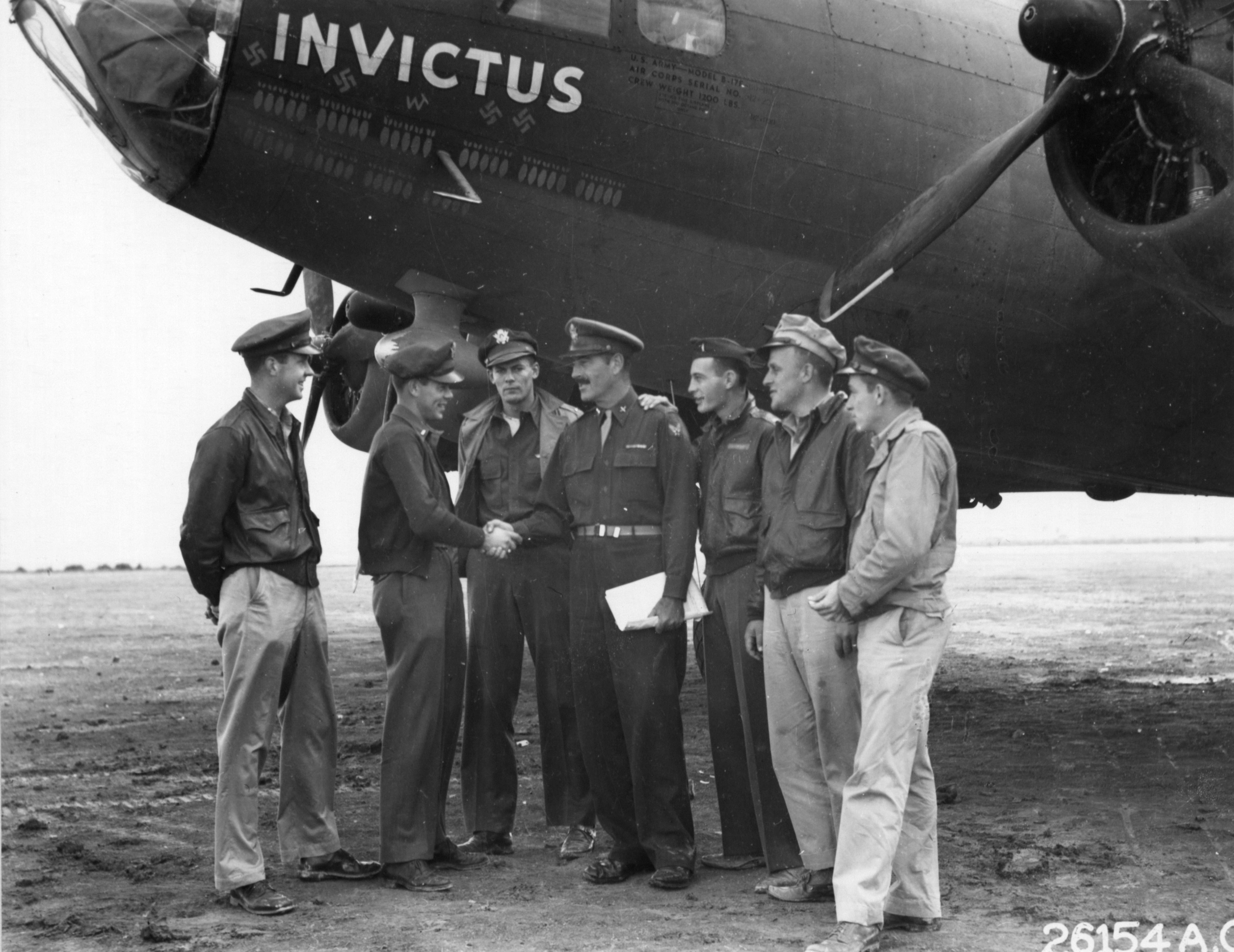 15AF B-17F Fortress 301BG353BS Invictus with crew after returning to base North Africa NA1057