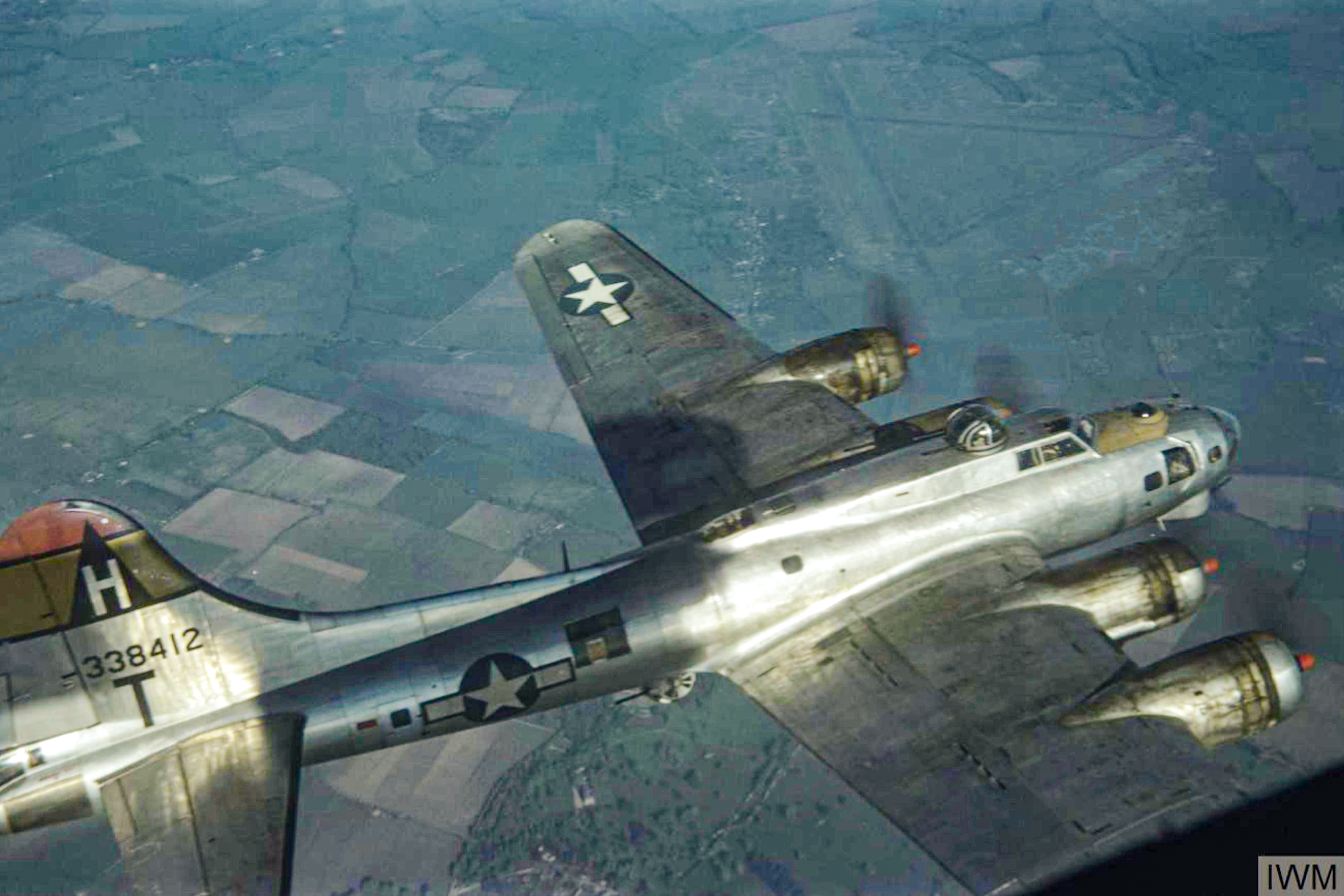 43-38412 B-17G Fortress 8AF 306BG367BS GYT in flight during a mission FRE5936