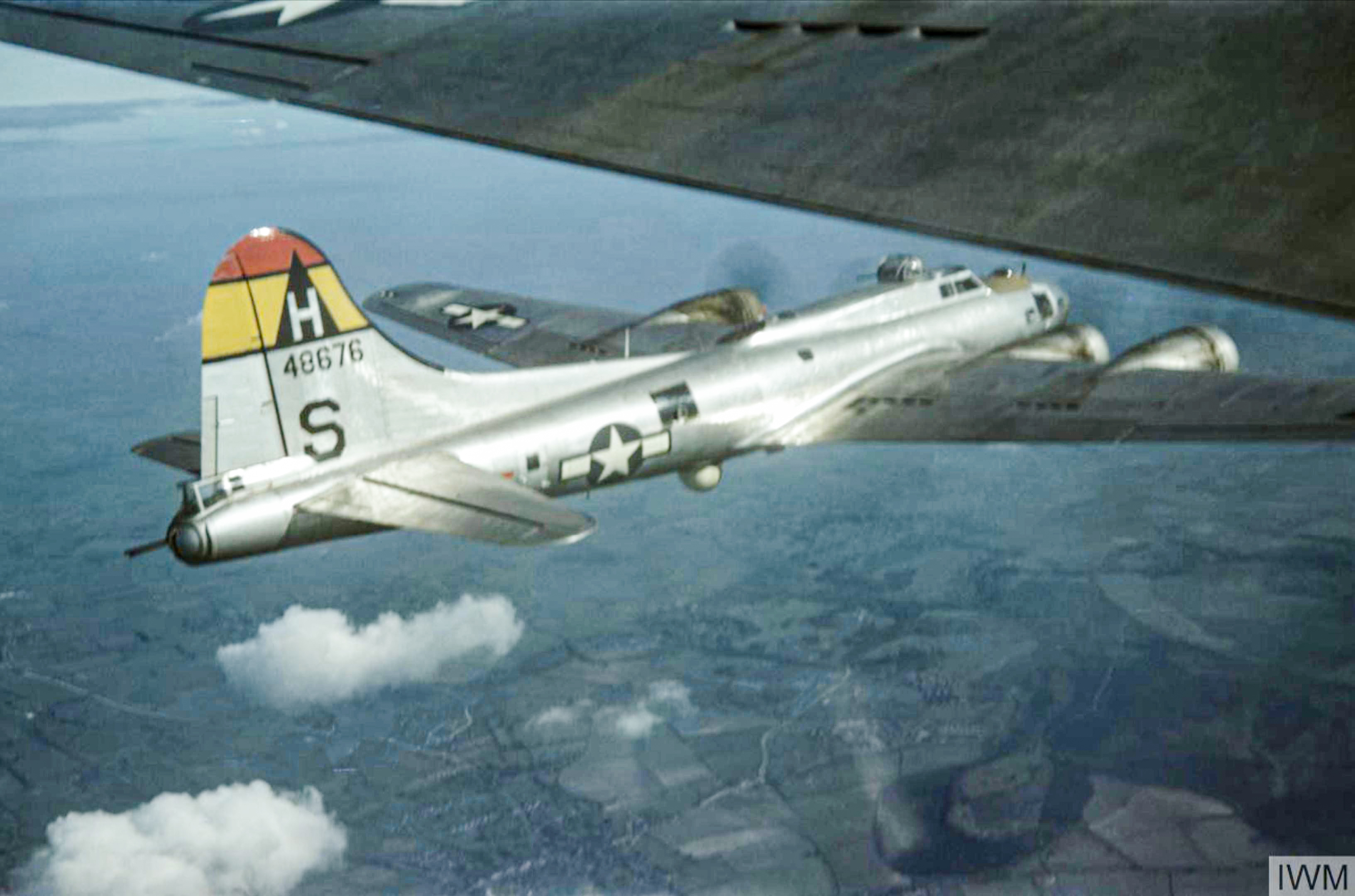 44-8676 B-17G Fortress 8AF 306BG367BS GYS in flight during a mission FRE5943