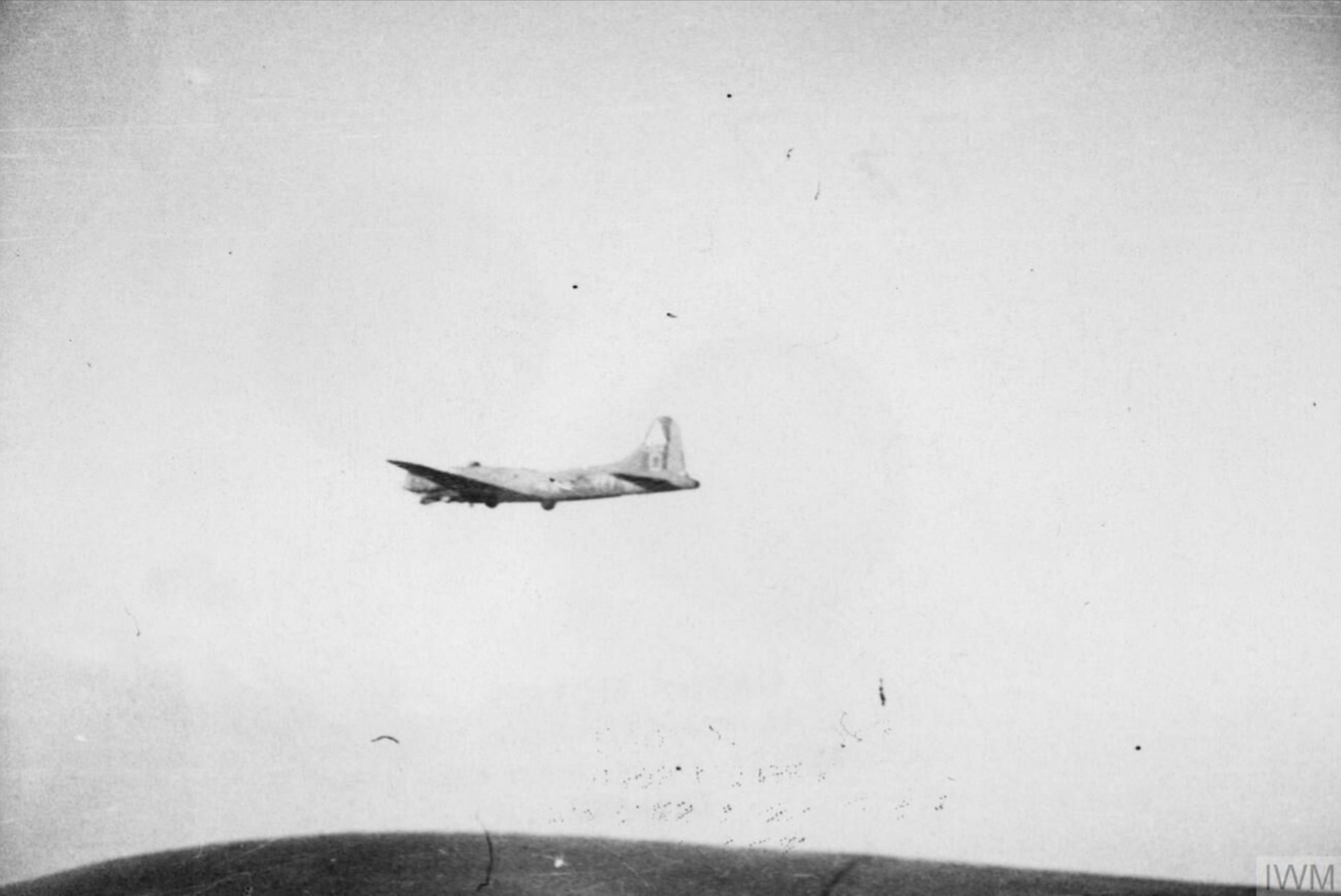 Boeing B-17F Fortress 8AF 306BG fly above the cloud cover in loose formation FRE4346