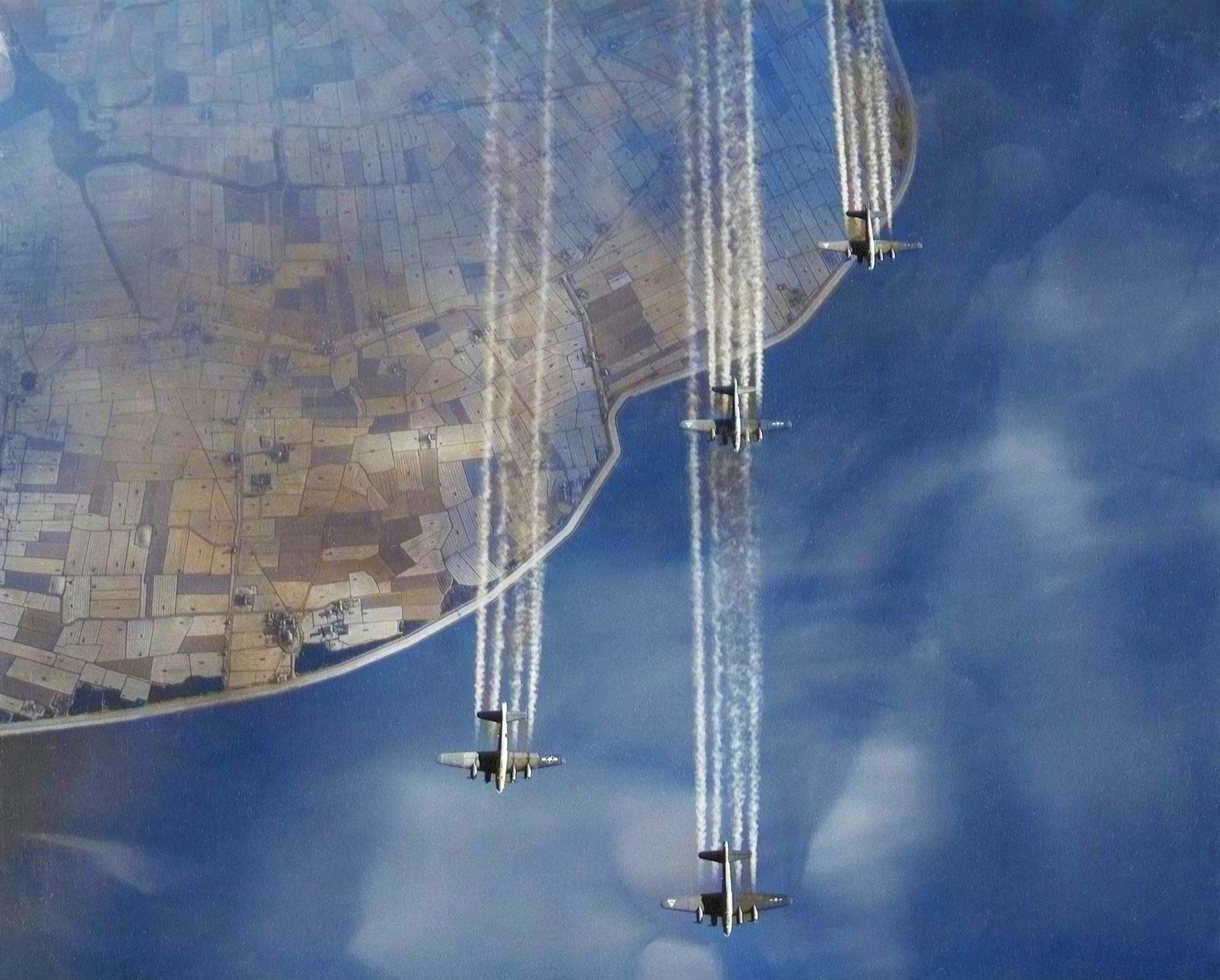 Vapor Trails from 8AF B-17 Flying Fortresses 306BG at 27,500 feet enroute to Kiel Germany 4th Jan 1944