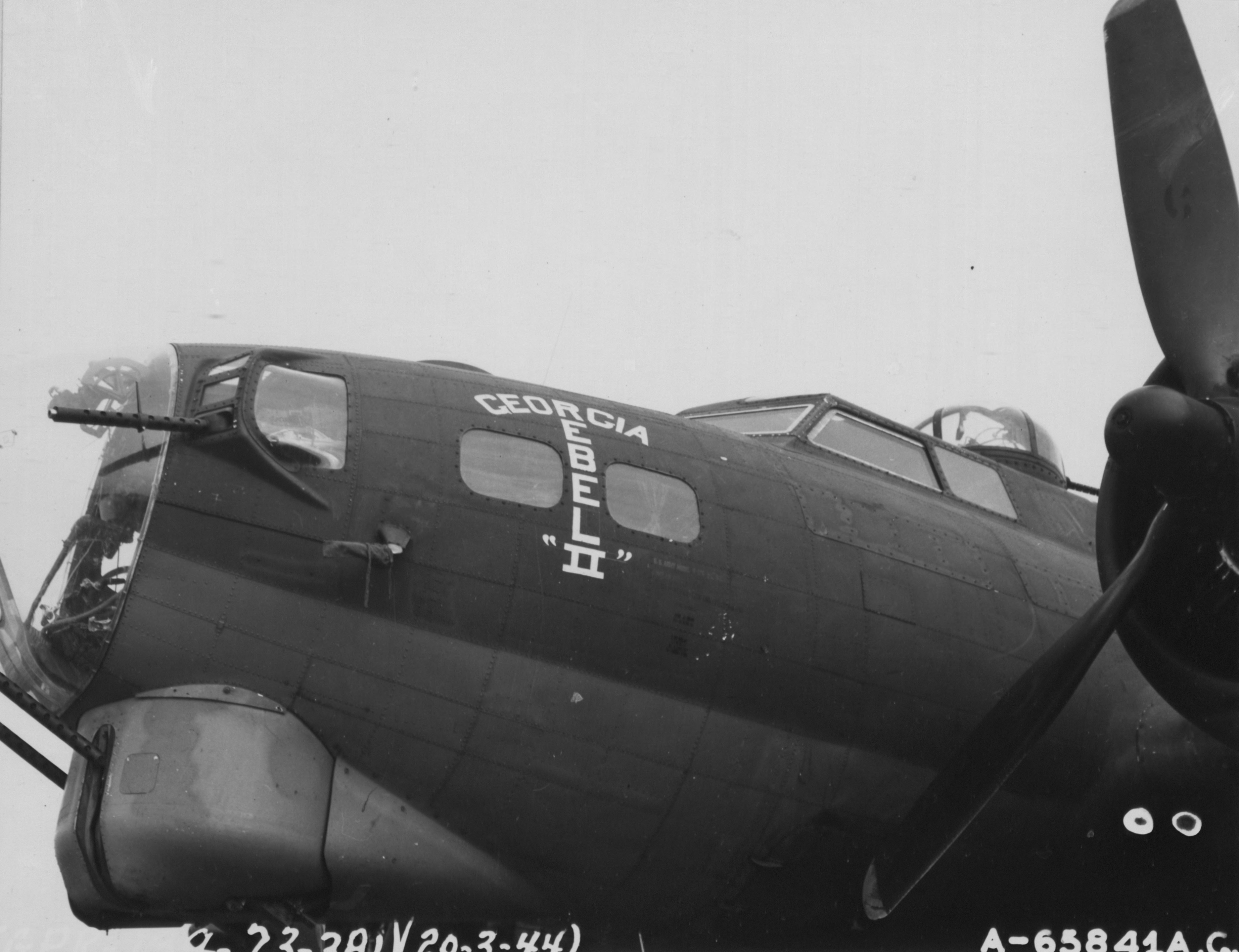 42-38061 B-17G Fortress 8AF 381BG533BS MSP Gerogia Rebel II nose art at Ridgewell 1944 NA551