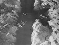 Asisbiz Boeing B 17 Fortresses 8AF 388BG fly over Norwegian Mountains 30th Mar 1944 FRE1499