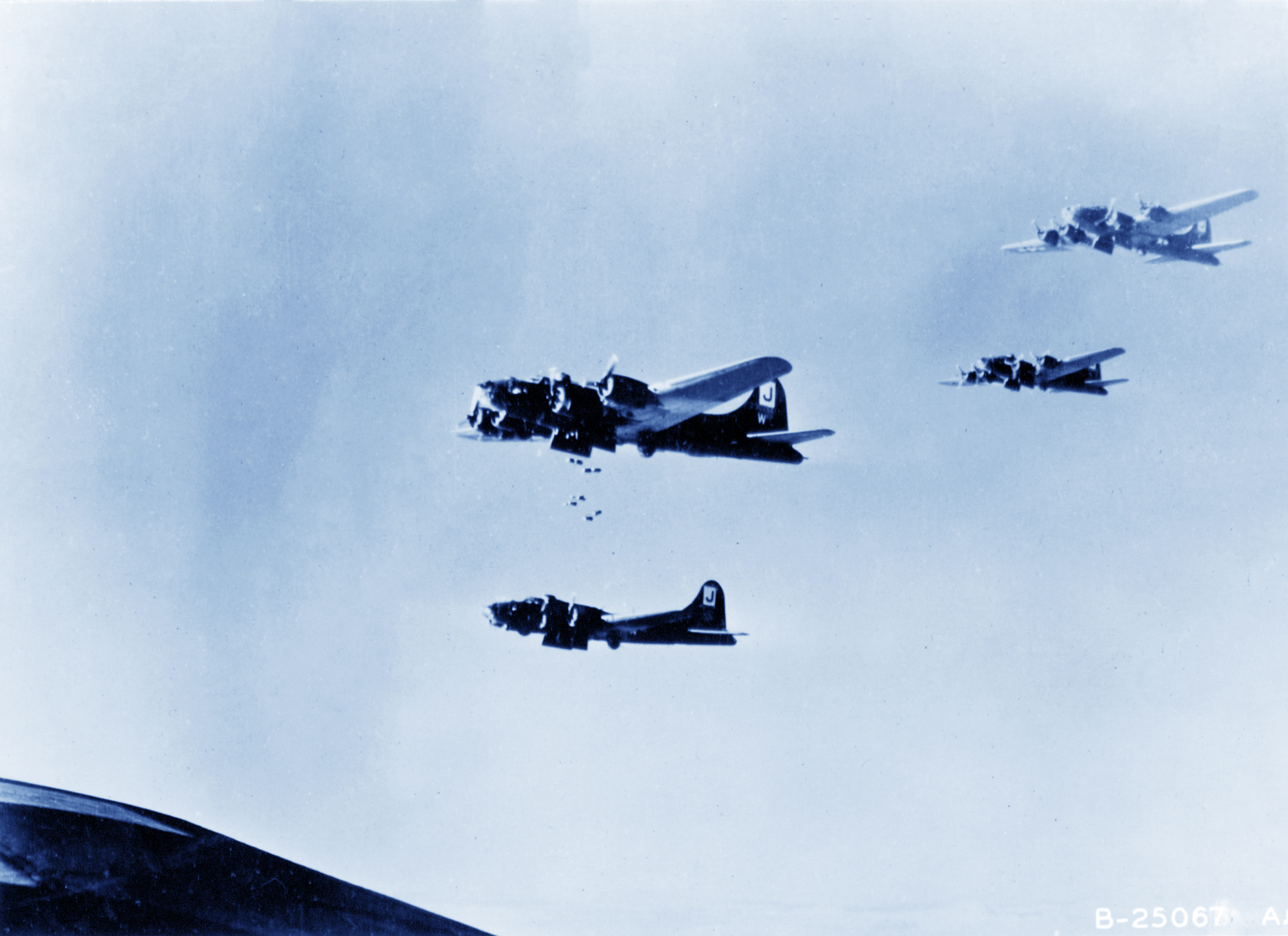 42-30266 B-17F Fortress 8AF 390BG569BS CCW Wild Children aka Lucky Strike over the drop zone 1943 NA1163