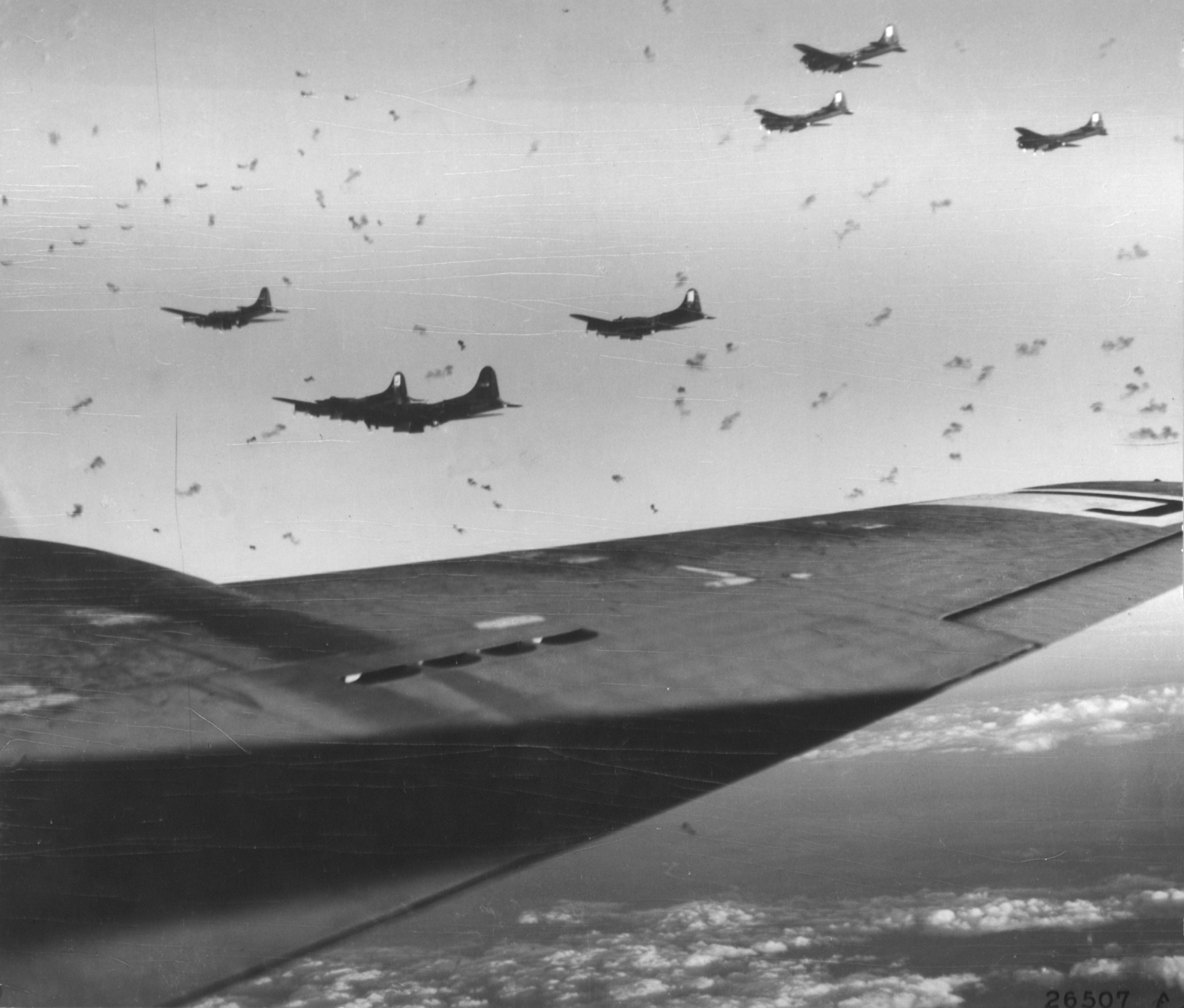 B-17 Fortresses 8AF 390BG flying through heavy flak over France 15th Dec 1943 342 FH 000510