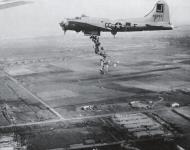 Asisbiz 44 6954 B 17G Fortress 8AF 390BG569BS CCF M Who Dat dropping food supplies over Holland 1945 01