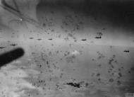 Asisbiz Boeing B 17G Fortresses 8AF 398BG6 fly through heavy flak at the drop zone FRE8043