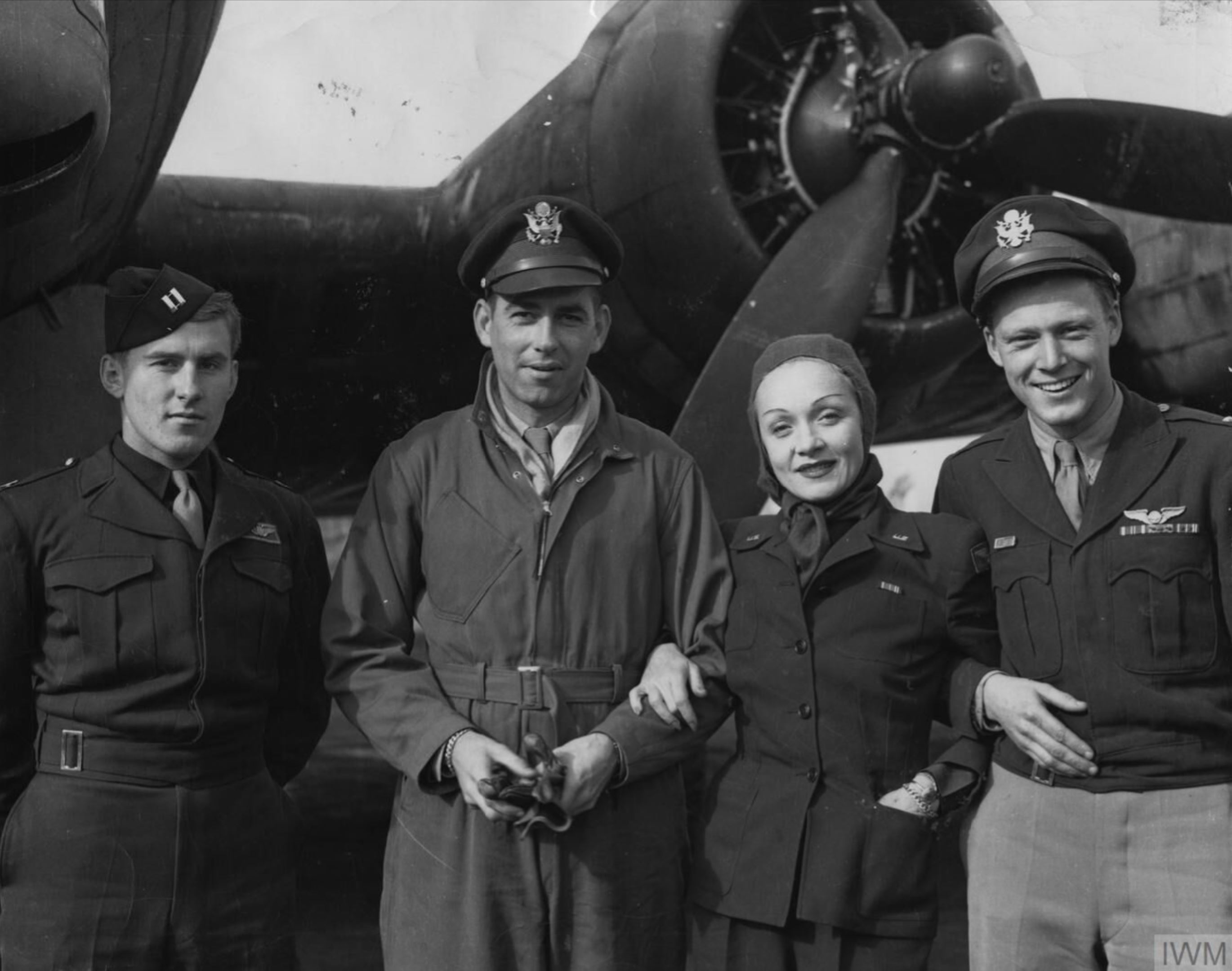 8AF 401BG airmen with Hollywood actress Marlene Dietrich after a ride B 17 Fortress named Pakawalup FRE1712